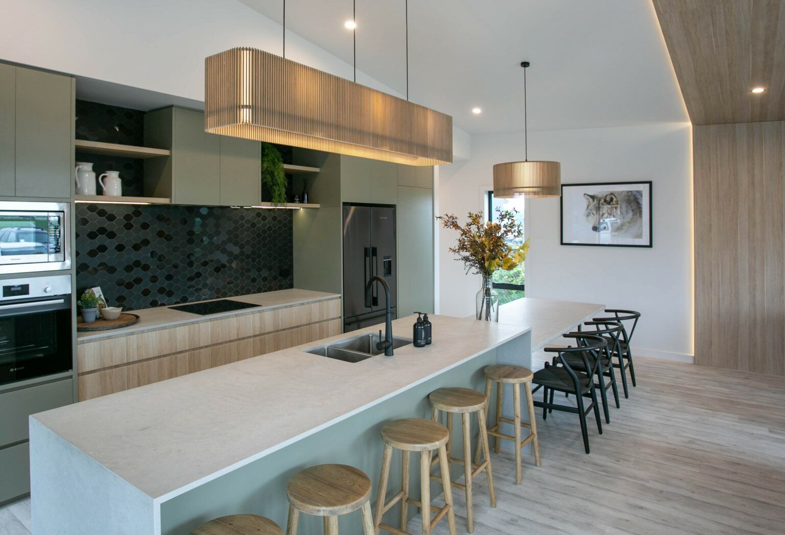 Sage green and timber kitchen