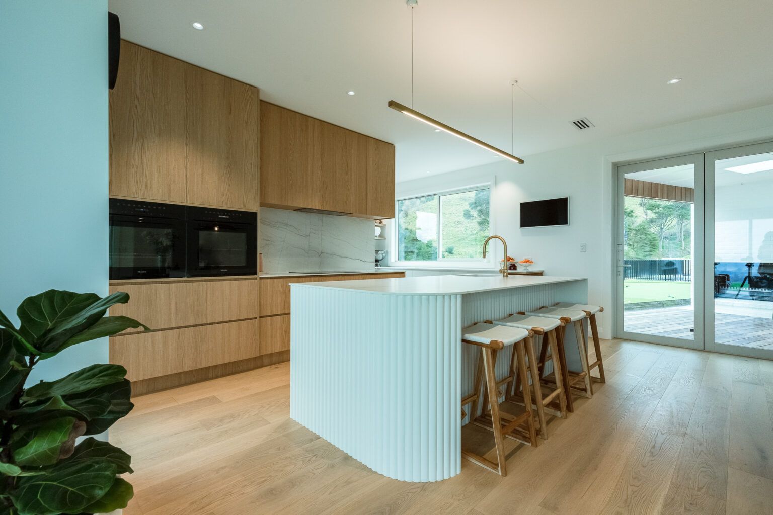 Timber veneer and porcelain kitchen